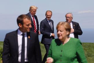 Pignatelli/picture-alliance/ROPI Stand up to Trump or miss opportunity for leadership: Donald Trump with Donald Tusk, Jean-Claude Juncker, Emmanuel Macron and Angela Merkel at the G7 summit in Quebec last year.