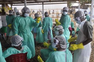 The world should have learned lessons from the Ebola epidemic in West Africa: Health workers in Liberia in January 2015.