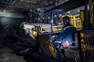China’s government promises to accelerate transition to renewables: worker in a coal mine in Inner Mongolia.