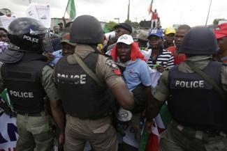 Protest at rising prices in view of fuel-subsidy cuts in Nigeria.