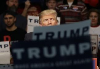 picture-alliance/dpa Donald Trump campaigning in Michigan in spring.
