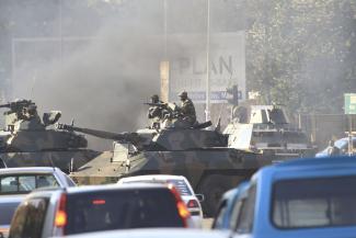 Tanks on the streets of Harare on 1 August.