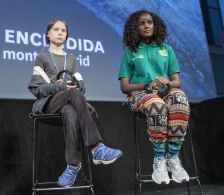 Greta Thunberg and Vanessa Nakate during a side-event at the climate summit in Madrid.