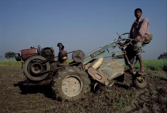 Smallholdings must become more productive: Bangladeshi farmer with a motorised plough.