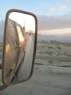 Rear-view mirror of a German army truck.