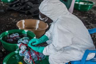 Sterilising protective masks in Monrovia.