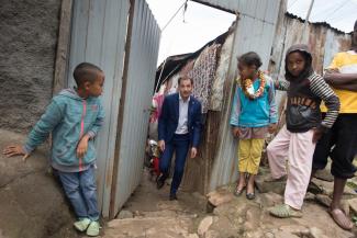 Alexander de Croo, Belgium’s minister for international development, visits a disadvantaged neighbourhood during the summit in Addis.