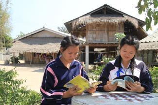 Buya and Armer, members of the Akha community.