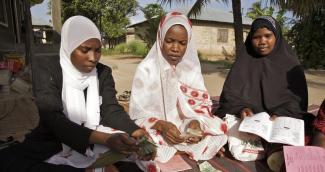 Women need access to finance: Women attend a micro finance collection in Zanzibar, Tanzania.
