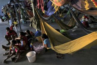 picture alliance/AP Images |/ Eraldo Peres Indigenous Warao families from Venezuela in a shelter in Roraima, Brazil’s northern state.