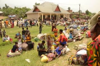 Refugees from the Democratic Republic of the Congo on the Ugandan border in February 2022.