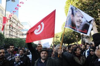 picture-alliance/ZUMAPRESS.com No rule of law after the Arab spring: the assassination of Tunisian opposition leader Belaid Chokri sparked new protests in February.