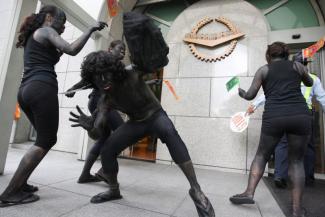 In front of the ADB headquarters, Greenpeace protesters expressed discontent with funding for coal-based power infrastructure in 2012.