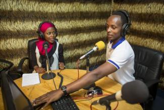 Young people in Rwanda producing a radio programme.