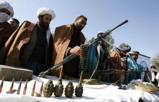 Surrendering weapons in Herat, Afghanistan, in November 2012.
