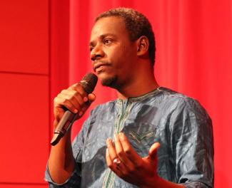 Film director Mamadou Dia speaking to an audience at Frankfurt’s Film Museum.