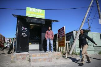 Africa attracts migrants: this man from Pakistan has an electronics shop in Cape Town, South Africa.