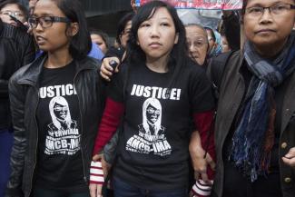 Domestic worker Erwiana Sulistyaningsih (center) from Indonesia was brutally abused by her Hong Kong employer who is now serving a six-year jail sentence.