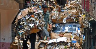 In Cairo, Egypt, garbage collectors make a living by collecting and sorting trash.