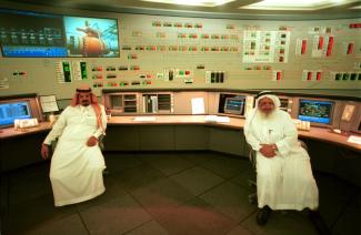 Tradition and modernity: control room of an oil refinery in Zahran, Saudi Arabia.