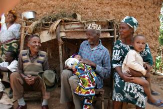 Traditionally, the family provides social protection in African countries: neighbours in a village in Tanzania.