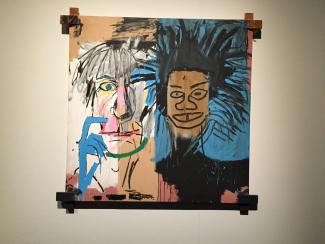 The painting „Dos Cabezas“ (1982) is a self-portrait of Jean-Michel Basquiat with Andy Warhol.