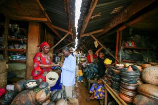 Healer procuring supplies for traditional medicinal use at a local market in the Nigerian city of Akure in August 2019.