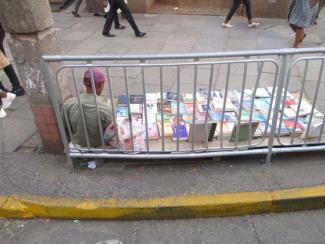 The informal sector remains huge: book seller in Nairobi.