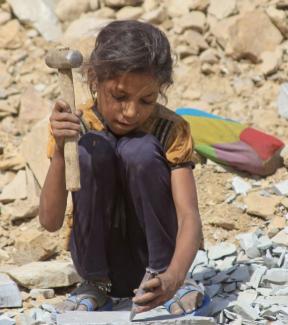 Child labour for the European market:  A girl in Rajasthan, India.