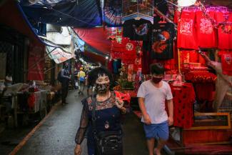 Shoppers in Jakarta’s Chinatown in February: Covid-19 has slowed down business.