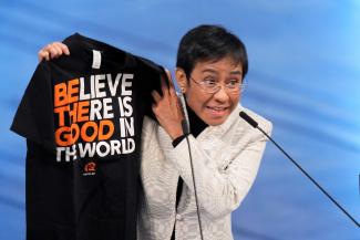 Maria Ressa with Rappler merchandise at the Nobel ceremony in Oslo in December 2021.