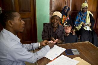 Kate Holt/HelpAge International Beneficiaries of Zanzibar’s universal social pension in 2018.