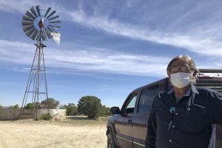 picture alliance / ASSOCIATED PRESS / Morgan Lee New Mexico has oil, but is exposed to climate impacts. Its indigenous Navajo community was hit hard by Covid-19.