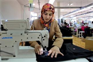 Garment factories create employment for young women, for instance in the village of Kitteh in northern Jordan.