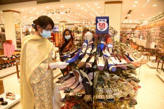 More people have more choices: shoppers in Dhaka.