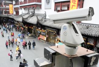 Cameras monitor what goes on in public places. Here in Shanghai.