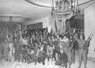UMAM Combatants inside the Holiday Inn in Beirut in the mid 1970s: the war was ravaging the downtown area.
