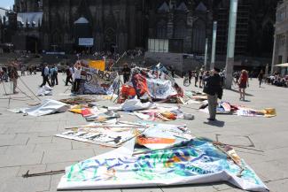 Preparing art exhibition in front of Cologne Cathedral.