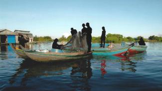 "I took photographs of village scenes and painted black silhouettes over the people in the snapshots"