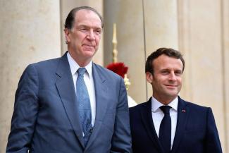 David Malpass and Emmanuel Macron have spoken out in favour of debt leniency. This picture was taken in May 2019 in Paris.