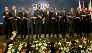 The ministers of 11 nations celebrate the conclusion of the Comprehensive and Progressive Agreement for Trans-Pacific Partnership in Santiago de Chile in March. The participating countries are Australia, Brunei, Canada, Chile, Japan, Malaysia, Mexico, New Zealand, Peru, Singapore and Vietnam.