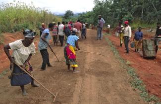 A rare sight in Mozambique: members of the Frelimo and Renamo parties work together to construct a road.