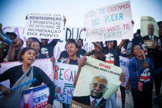 Civil-society engagement in Mozambique: Demonstration against a law on new privileges for members of parliament in Maputo in May.