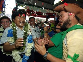 Bolivian president Evo Morales (left) speaks with representatives of La Via Campesina, an international network of small farmers, at the 2010 UN climate summit in Cancún, Mexico.