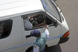 Bribing a policeman.