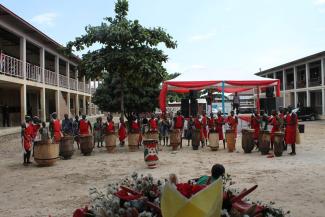 Schoolgirls in traditional clothing at the award ceremony for their vocational school diplomas.