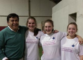 Carlos Collio and German volunteers in the school’s gym; Miriam Keller is standing in the middle.